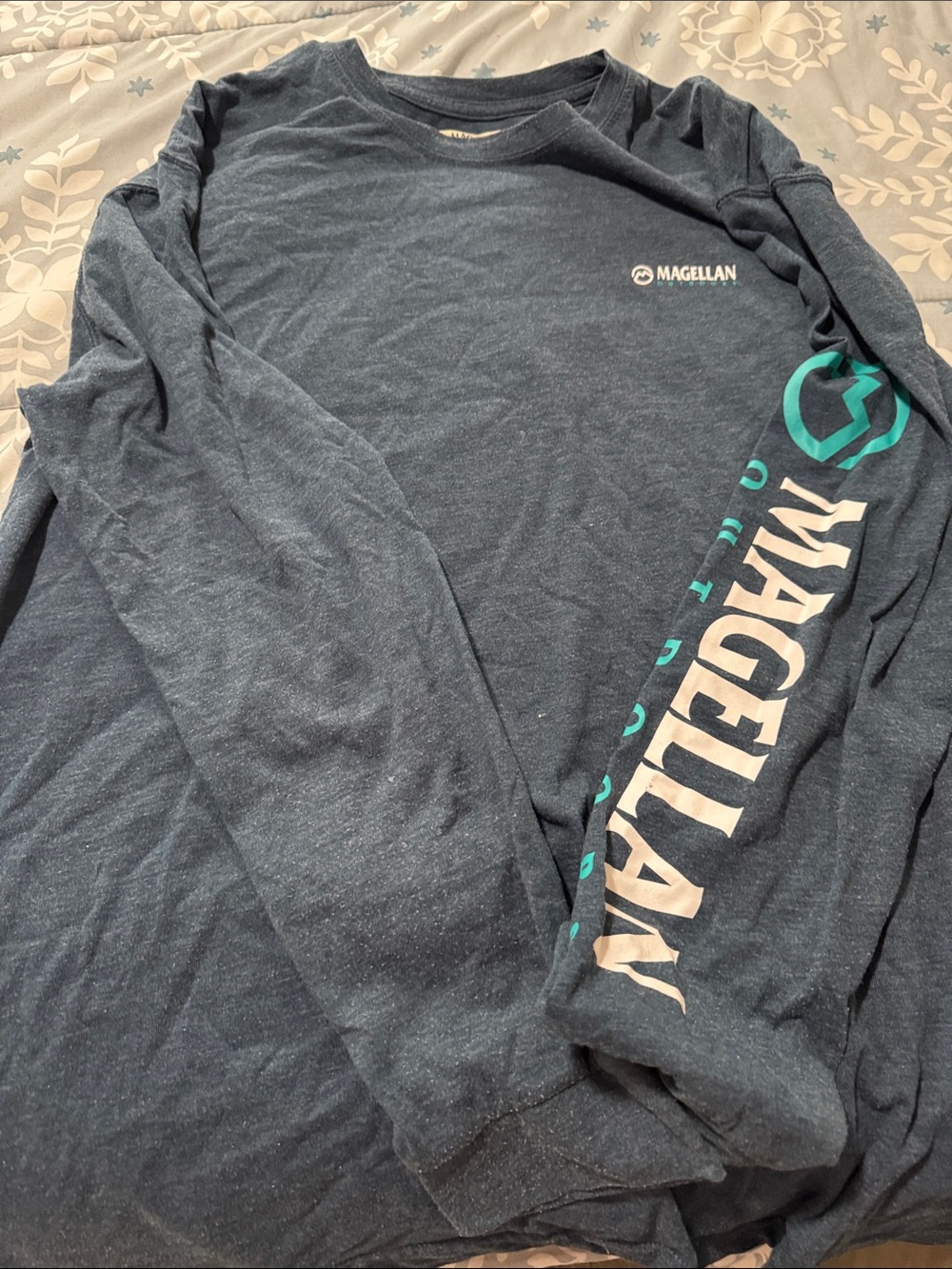 Magellan Outdoors Long Sleeve Tee in Dark Blue with Teal Sleeve Logo